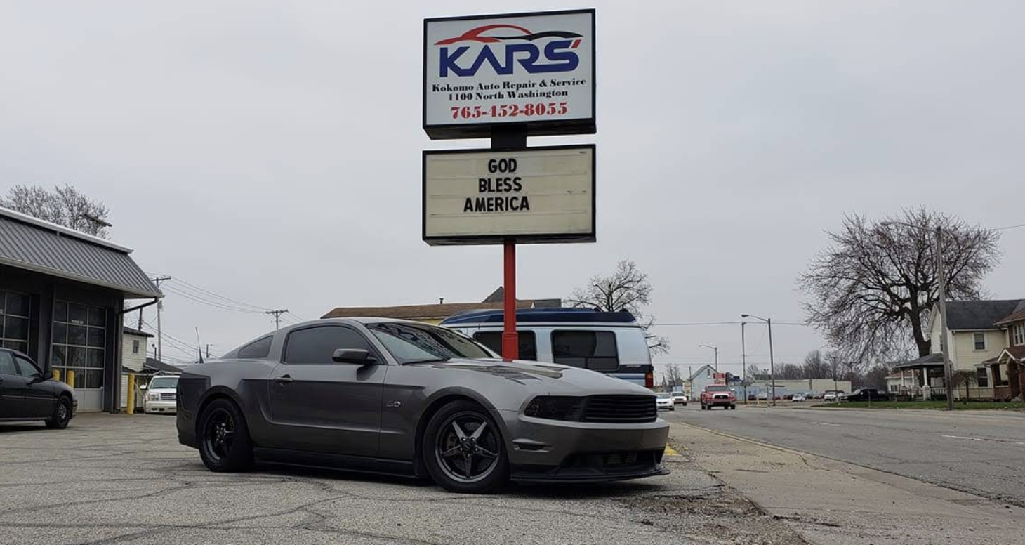 Vehicle parked outside Kokomo Auto Repair & Service garage bays on North Washington Street